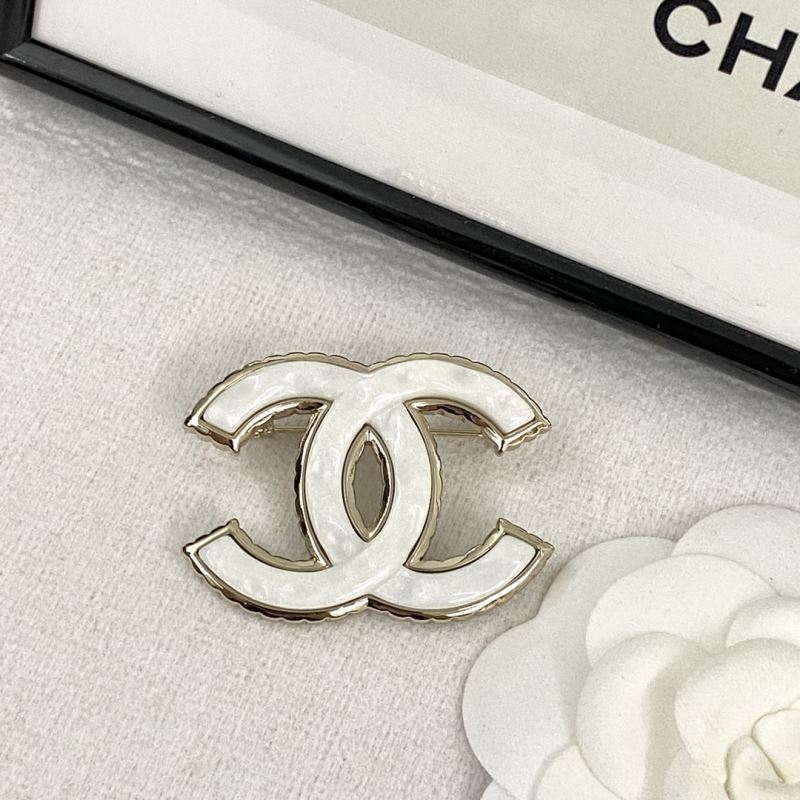Ch*el brooches